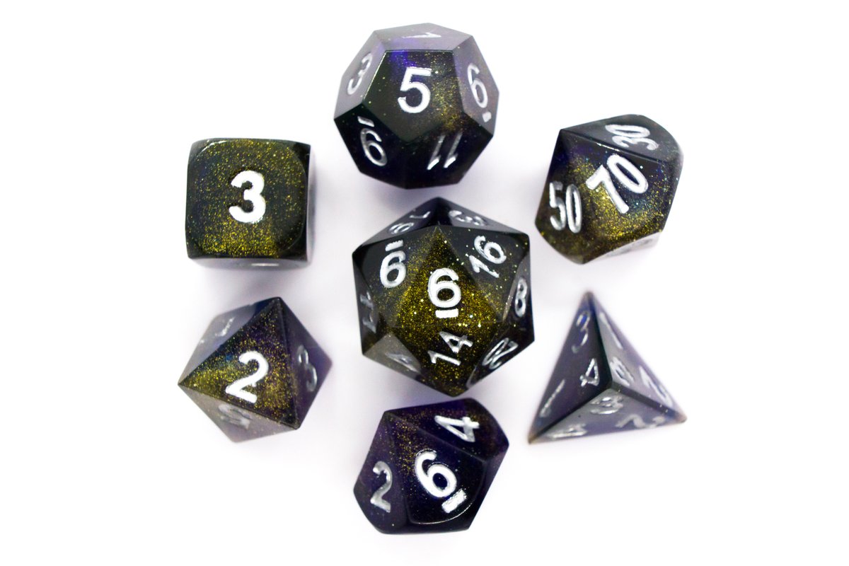 Handmade resin dice in dark blue with gold dust and silver ink, very minor flaws on some of the facets that face the lid --> 70 Euro excluding shipping.