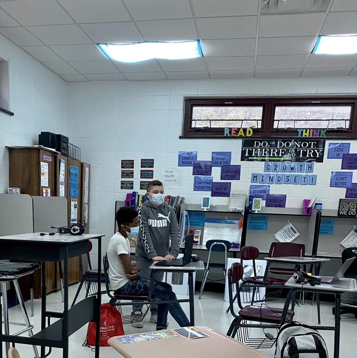 When we catch students emulating the Bull Dog way... here is a student teaching another how to work on an assignment in E148.