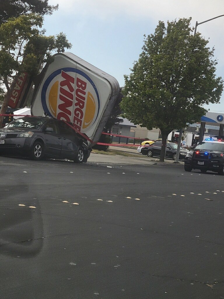 RaySkiTheKing's tweet photo. Somebody finna get PAID! The burger king in san pablo sign fell down and crushed a car‼️ https://t.co/OG6stSAu2C