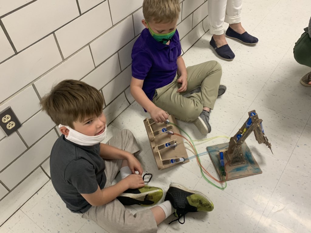 sherylwoods_'s tweet photo. Our Kindergarten Huskies showed off their learning during Recycling Palooza today! It was awesome to see them teach older kiddos about how they made a hydraulic arm out of cardboard, how to record a podcast, make eco bricks and more! #HuskyPROUD #npossible https://t.co/z2G3qrrVAq