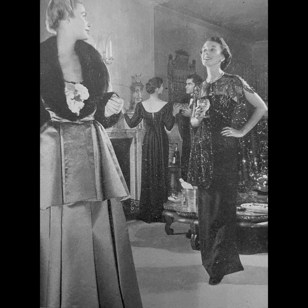 #222

Barbara Mullen (centre rear, with her back to the camera) wearing a Traina-Norell gown. 

Holiday, January 1949. Photographed at El Morocco by Fritz Henle.

#BarbaraMullen #Holiday #TrainaNorell #ElMorocco #FritzHenle #TheReplacementGirl #FashionHistory #ModelHistory