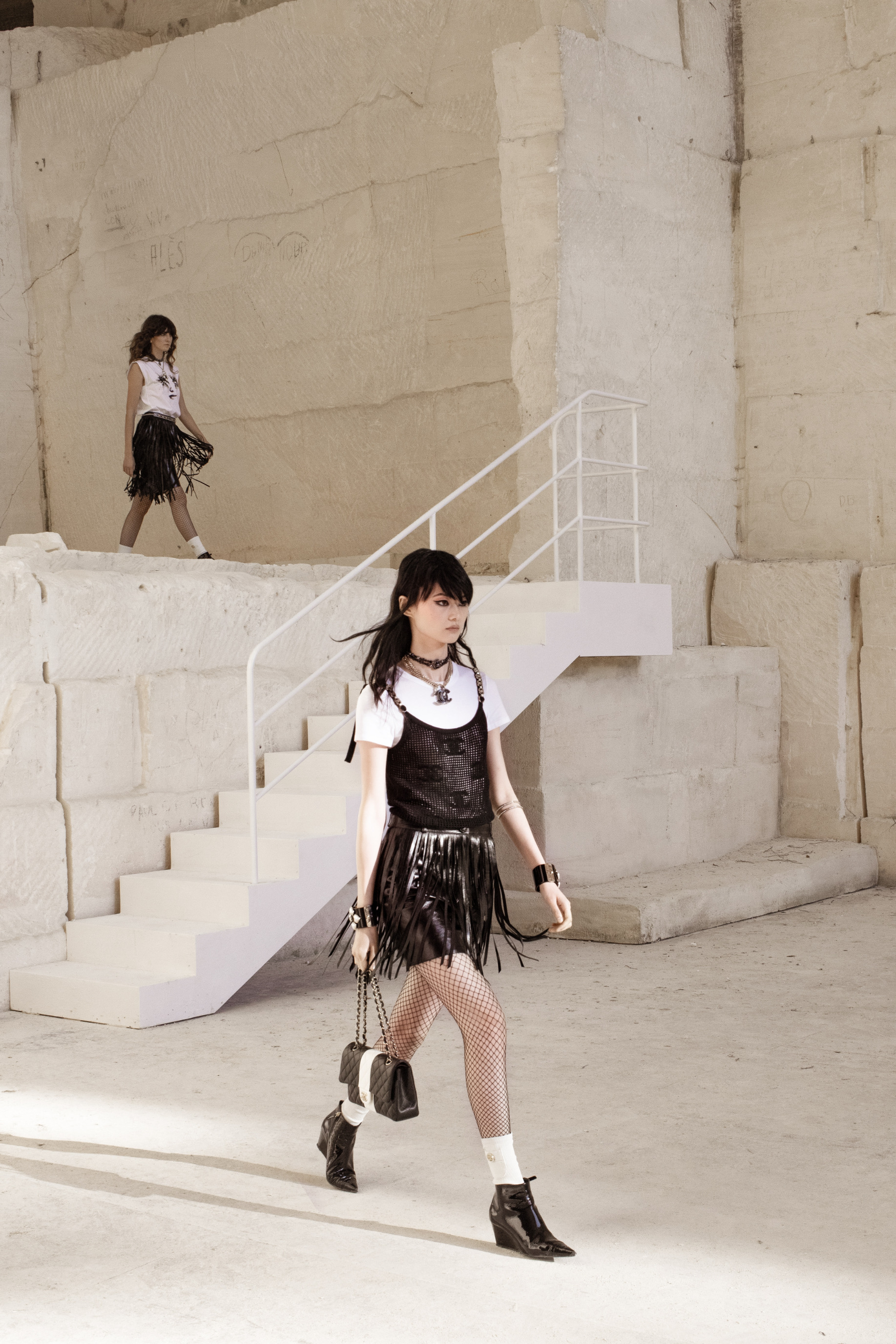 CHANEL on X: Amongst the limestone walls of the Carrières de Lumières, the CHANEL  Cruise 2021/22 collection by Virginie Viard embodies a play of contrasts  between the sixties, rock and punk in