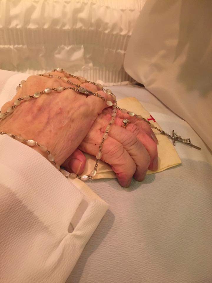 Many years earlier, this woman attended the priestly ordination of her own son. During that ordination Mass, her son's hands were anointed with oil by the bishop. That oil was then wiped off with a cloth called a "maniturgium."