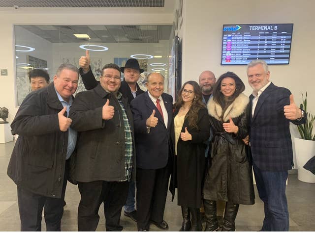 9/But an uncropped photograph, obtained by  @BuzzFeedNews, shows 3 other people who were part of the trip:  #ChanelRion,  #OAN host; Yan Aronov, a business partner of Artemenko; and  #Doc Williams, the bodyguard.