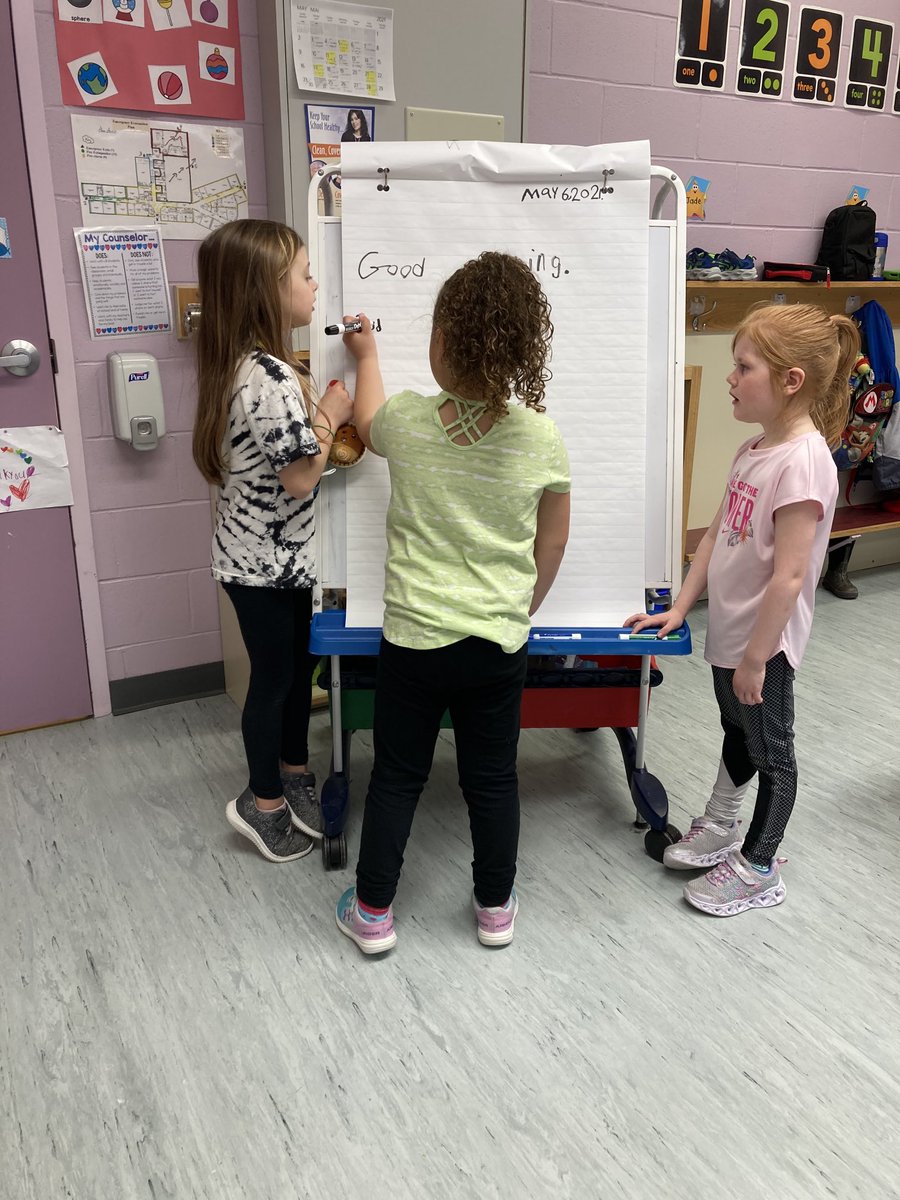 hopefleming's tweet image. ⁦@NLESDCA⁩ Who needs the teacher to help you when the Grade One student is there to help the Kgn students write the morning message! #sharethepen #multigrade