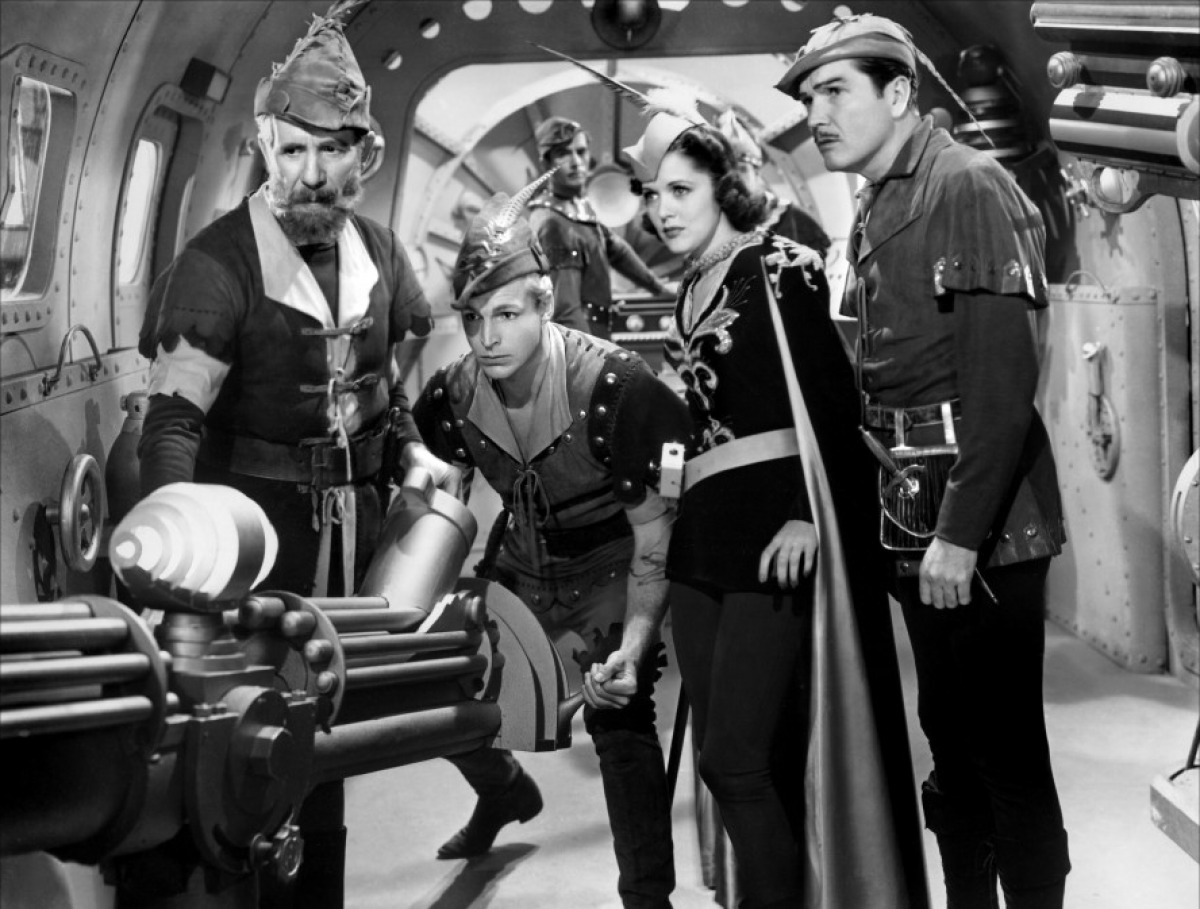 Flash Gordon's cinematic look was always a combination of original costumes and whatever Universal had lying around. By 1940, Orientalism was out, Robin Hood was in.