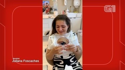 Mulher que perdeu os dentes após agressões do ex chora ao sorrir de novo depois de dois anos de tratamento; veja vídeo glo.bo/2RzwTrD #G1