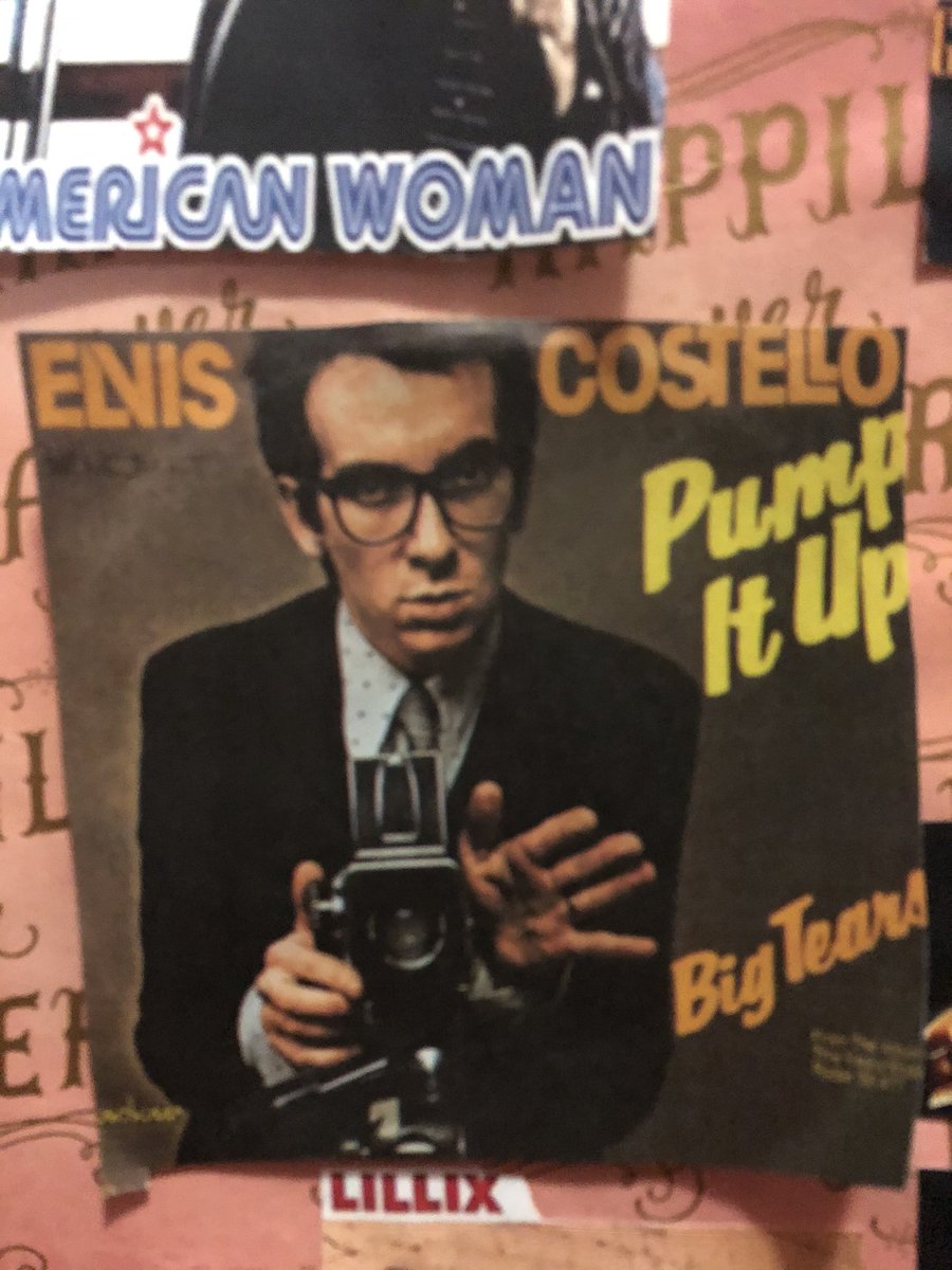 5/6/2021 - my featured artist collection of the day:  @ElvisCostello 3 1/2 in. x 4 in. Pump It Up print on pink “happily ever after” wallpaper The Very Best of Elvis Costello And The Attractions greatest hits album CD