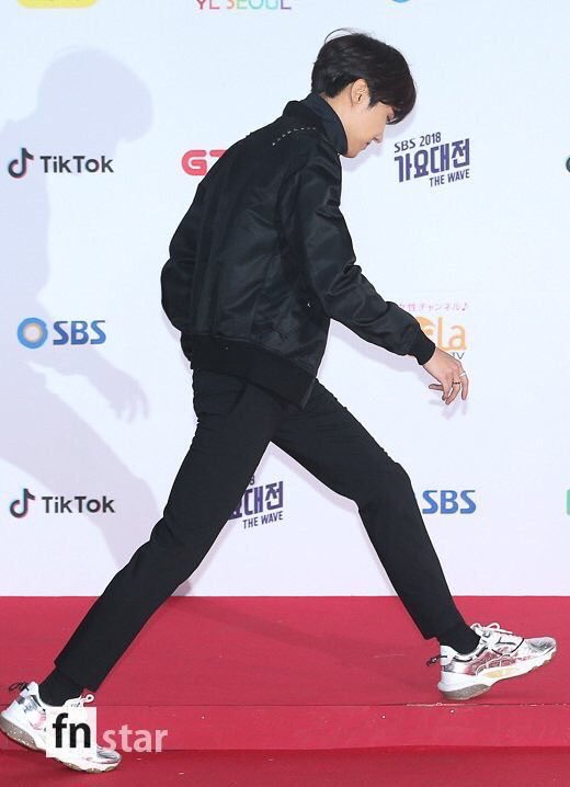 Just walking with his long legs