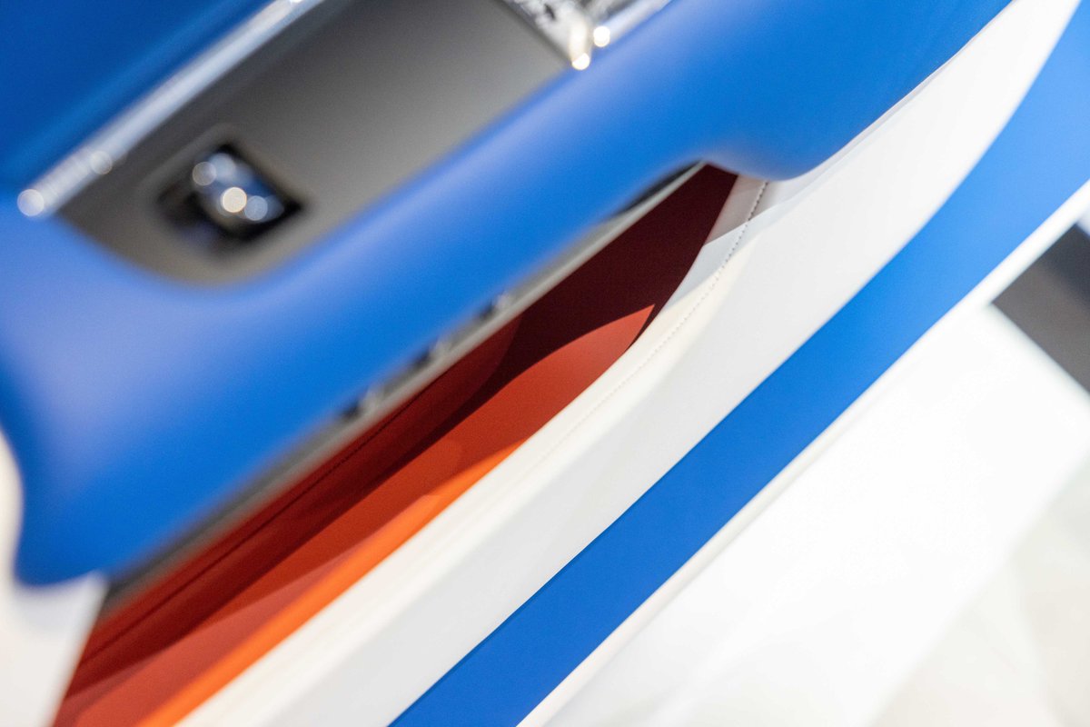 This Wraith Black Badge finds inspiration in dramatic use of #colour. 
For the Auto China Collective, Shanghai, the two-tone Bespoke GT Blue and Arctic White coachwork were finished with a Koi Red coachline, inspired by a volcanic eruption against a menacing blue sky.
#RollsRoyce