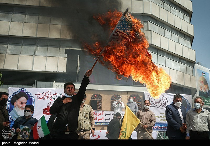 While the U.S. is signaling its willingness to lift many sanctions off  #Iran, the regime dispatched its supporters today to:-burn images of Biden repenting-burn the U.S. & Israeli flags-have kids in military uniforms point guns at a Biden cartoon extending his hand #QudsDay