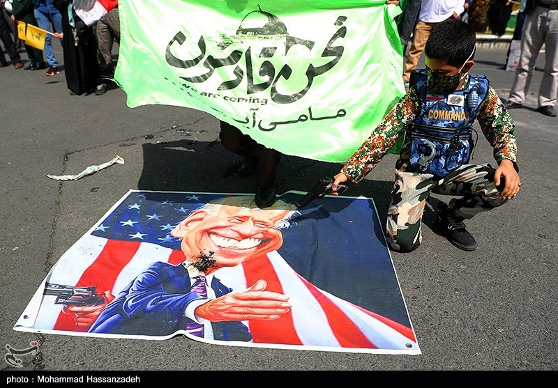 While the U.S. is signaling its willingness to lift many sanctions off  #Iran, the regime dispatched its supporters today to:-burn images of Biden repenting-burn the U.S. & Israeli flags-have kids in military uniforms point guns at a Biden cartoon extending his hand #QudsDay