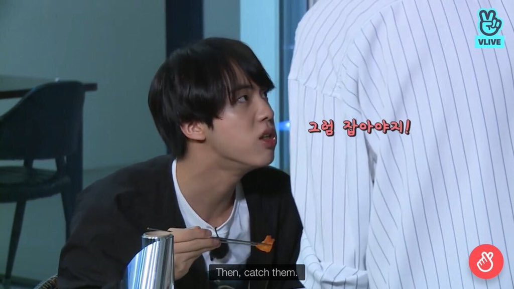 Seokjin putting the banana peel on the camera