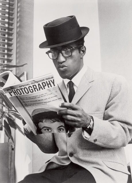 BlakAmericans's tweet image. Sammy Davis Jr. reading the latest copy of Photography Magazine in between publicity photo shoots in downtown Manhattan, New York City, NY. 1963.