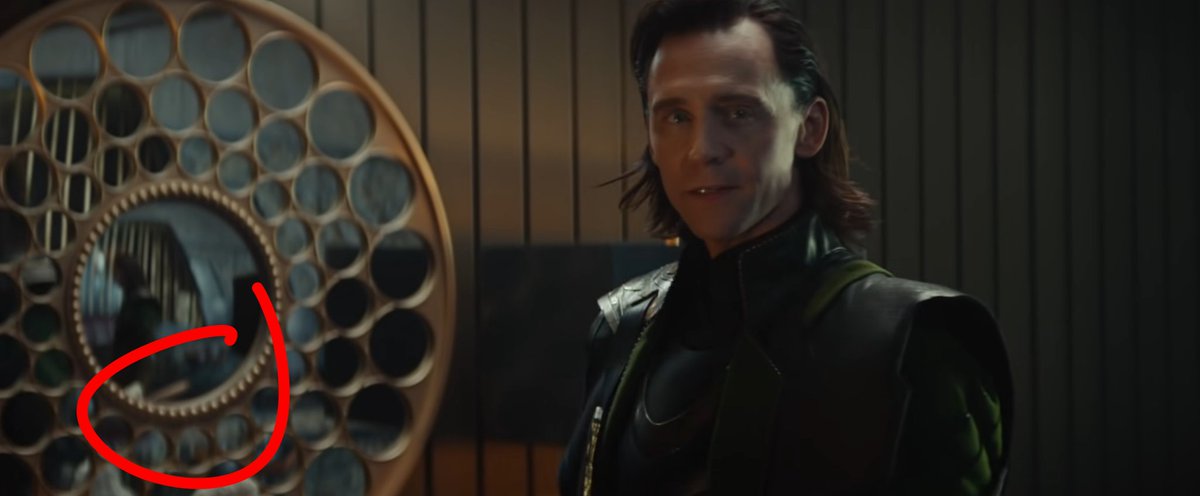 11. if you look closely at loki's reflection, you see that appears that he is holding the scepter