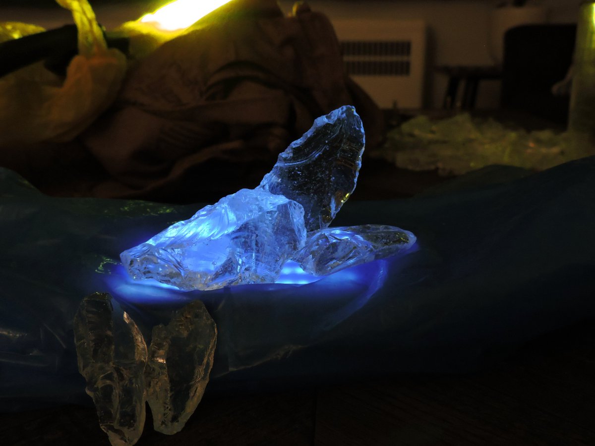 And ice! Transparent reflective objects like ice, glass gems etc don't behave like opaque items in terms of lighting. So I got some fake ice chunks from the craft store and lit them below (for the magic) and warmly from the tops and sides for the fire.