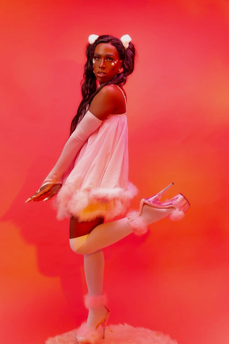 "This bubblegum, cotton candy moment is a true testament to my inner child who always wanted to embody all things fabulous and feminine. A Black Barbie. A Bratz doll. I look like you could take me right out of a box, play with me, and be astounded by how super cute I am...