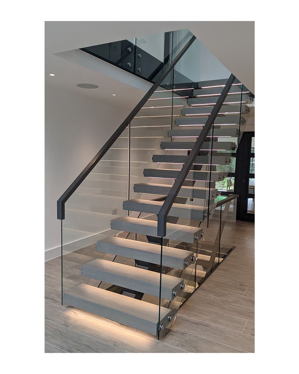 Central Spine Staircase, grey oak treads, anthracite spine and rails, comlete with a toughened glass balustrade and LED tread lighting.

#design #stairs #staircase #steps #floating #floatingstairs #glassstairs #glassstaircase #modern #modernstairs #modernstaircase