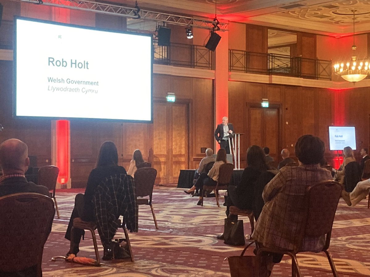 Conference_News's tweet image. #EventPilot | Rob Holt from the Welsh Government is now on stage. He’s explaining the thinking behind today’s event, the format of which is very much down to them. @TheCelticManor doing a fine job as hosts