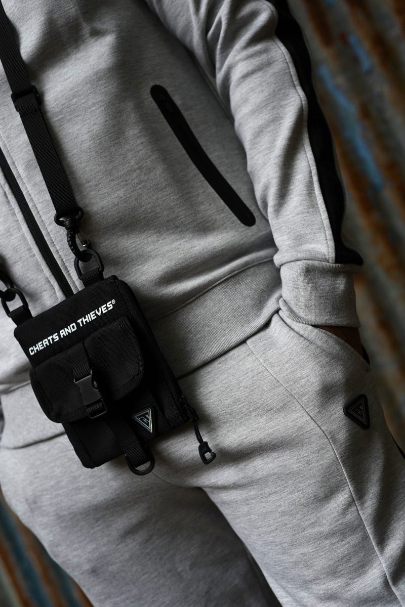 New In “Slim Fit Hologram Tech Fleece 
#CheatsAndThieves Tracksuit 
Now Available Online Via Our Webstore CheatsAndThieves.com 📍