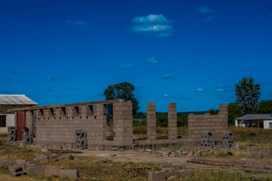 Can you feel the energy coming from this beautiful and expansive blue sky?This is the sky under which our Mtupane Library stands in Lupane. 
Slowly, brick by brick, our library is taking shape ❤️.
Note:This library supported by the DAP grant from the Australian Embassy, Harare.