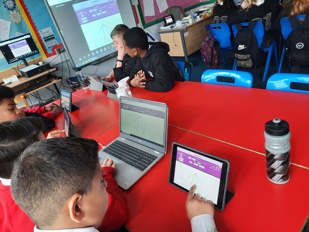MrsScottCCPS's tweet image. P7 at live Maths lesson, exploring patterns, using mathsbot.com #JourneytoSTA #digitaltransitions @StThomasAqSec