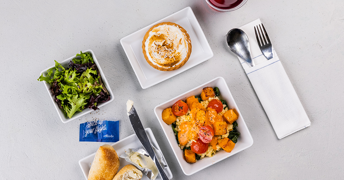 AlaskaAir's tweet photo. Raise a glass to more food &amp; beverage options on board.🥂 Favorites like the Signature Fruit &amp; Cheese Platter are available via pre-order. In First Class, hot meals are back on coast-to-coast &amp; Hawaii flights. Plus beer, wine and spirits are now available in Main Cabin. Cheers! https://t.co/4Uky6tD8M3