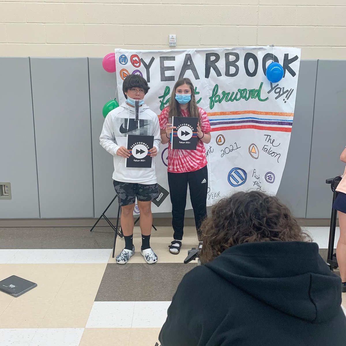 yearbookDNMS's tweet photo. Yearbook Distribution was a major success, we had a blast handing out books and seeing everyone finally hold what we’ve worked so hard for all this year. 
*if you haven’t picked up your copy, stop by the main office tomorrow. 
#falconpride @DNMSFalcons @DerbySchoolsKS https://t.co/5ZrrtRoDfJ