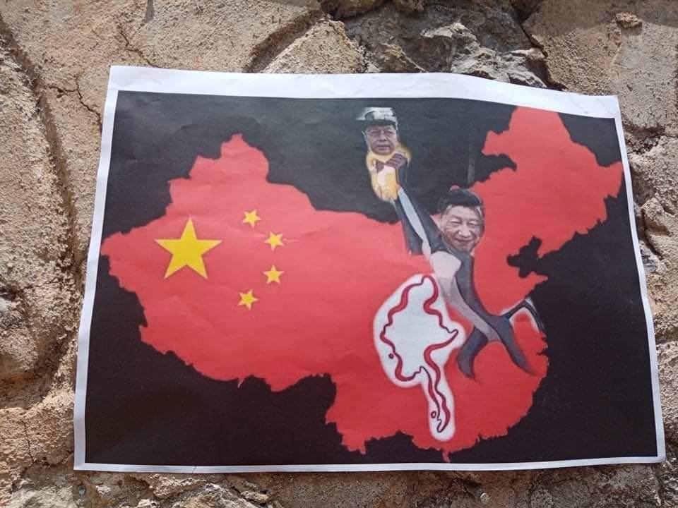 Chan54581634's tweet photo. "POWER MADNESS, DOG SPIRIT," Memes strike in #Taunggyi today, showcasing MAL's power craziness. Despite the Junta's suppressions, brave youths find innovative ways to oppose dictatorship. #WhatsHappeningInMyanmar  #May21Coup  #GlobalArmsEmbargo https://t.co/GYnQ0QDw5W