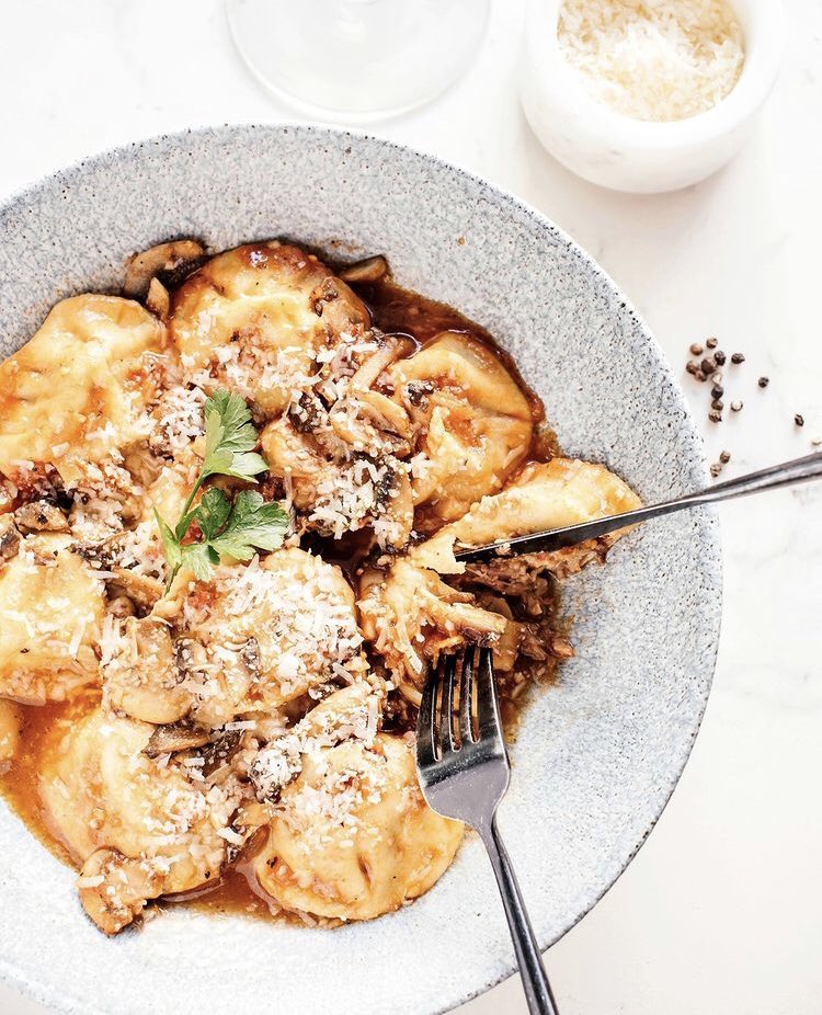 We putting a twist on an Italian classic with our new pasta offering, Lamb Ravioli! Homemade braised lamb ravioli. Served in a sauteed mushroom, garlic, white wine and herbed tomato sauce.
