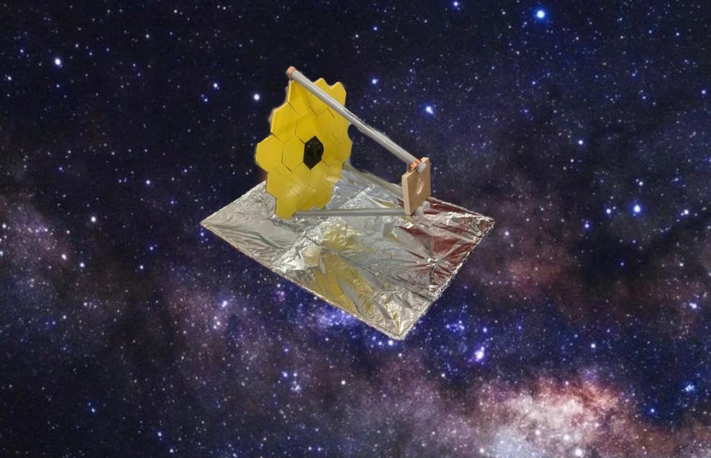 The large-scale Webb telescope model created by one of Mr. Caprioli's class, photoshopped onto a space image background.