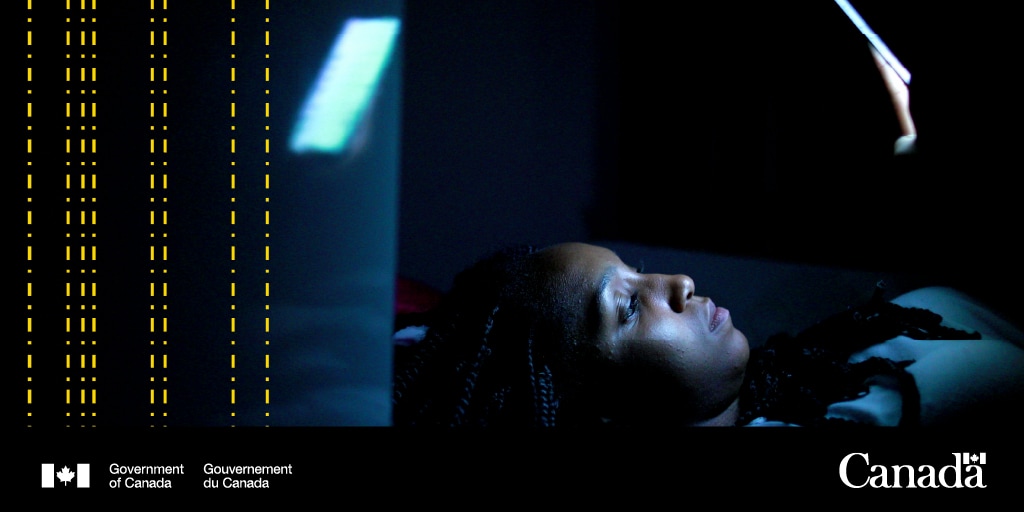 Teen looking at a screen.