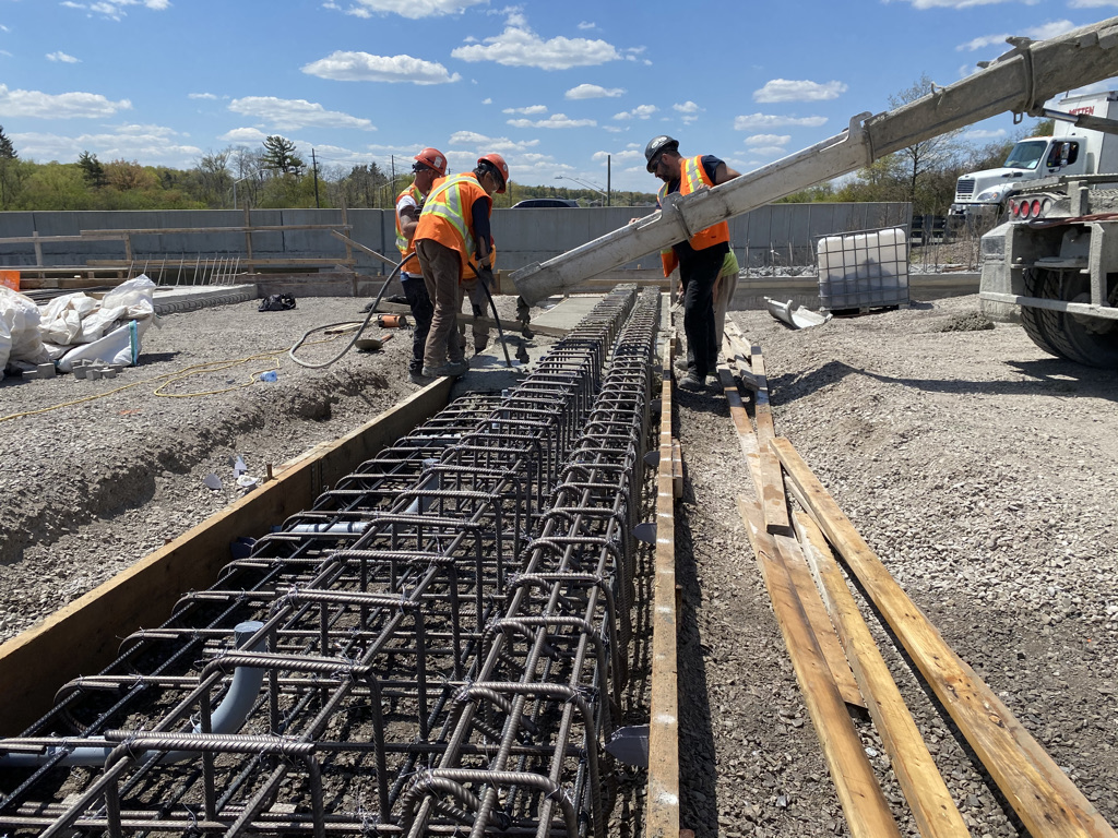 Bot is finishing up bridge works with the pouring of sidewalks and sleeper slabs at our QEW / 403 / Ford Drive interchange site in Oakville. The project is scheduled for a full highway opening and contract completion by November 2021. #civilengineering #haltonregion #construction