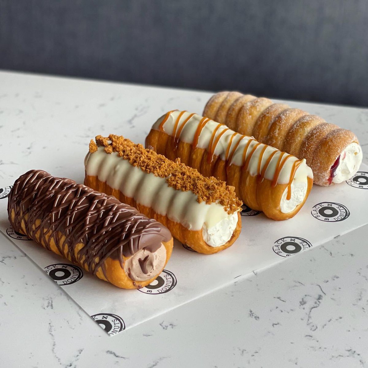 Stuart Robinson I M Drooling Introducing Black Box Donuts On The Lisburn Road Donut Canollis Aka Donollis Flavours Include Boston Cream Raspberry White Chocolate Jam Cream Black