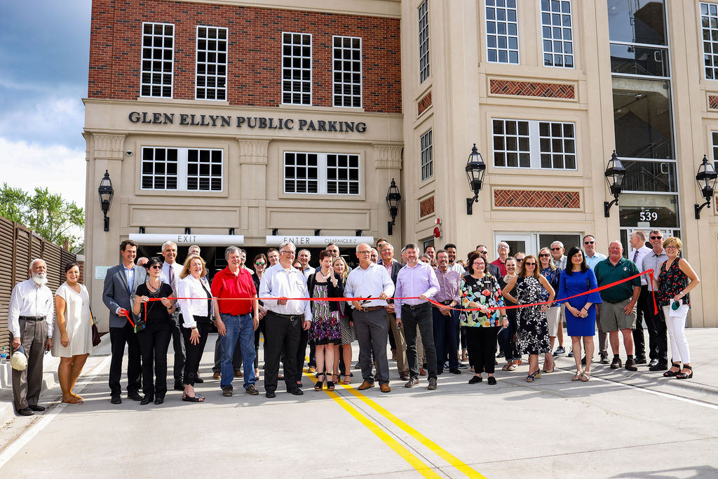 VillageofGE's tweet image. On May 20, a ribbon cutting ceremony was held to celebrate the new downtown Civic Center parking garage and pedway opening. Village officials, both past and present, community leaders, along with Village staff and members of the project team celebrated this major milestone.