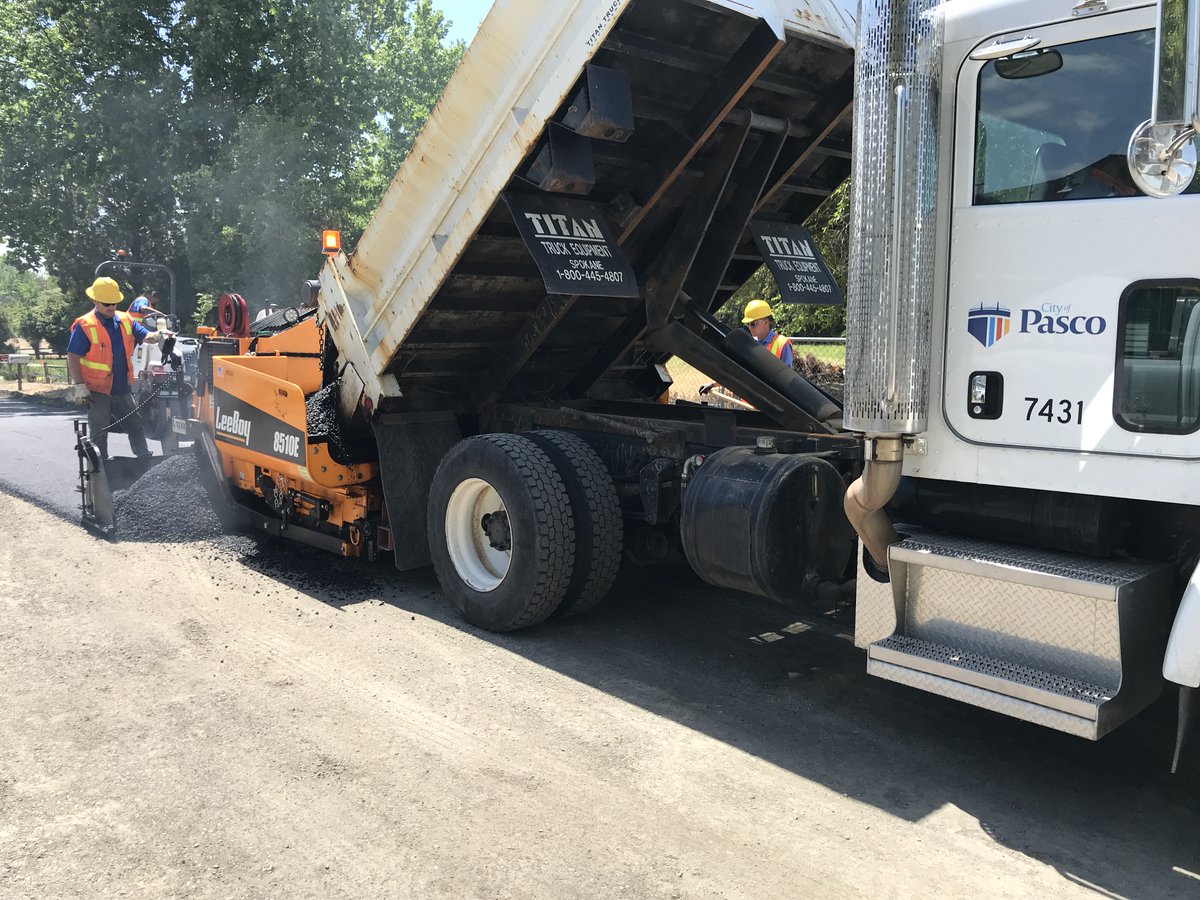 Pasco_WA's tweet photo. In honor of #PublicWorksWeek2021, some pictures of the paving on Road 76. Crews are busy on this project...as they are every day keeping streets passable, treating drinking water, treating wastewater, irrigating land, and planning for the future! Thanks, Public Works! #pascoproud https://t.co/kWg3Jo5vi7