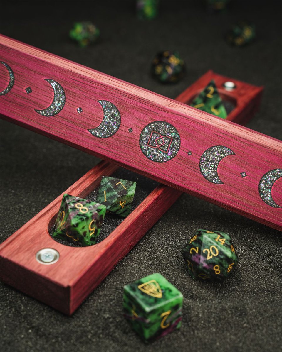 🔥 ✨ GIVEAWAY✨ 🔥
We're giving away this Kickstarter exclusive 'Lunar Vault' in Purpleheart with holographic flake and brass inlay AND a set of Ruby in Zoisite Gemstone Dice 😍

To enter the giveaway simply like and retweet 
Winner chosen on Monday✔️