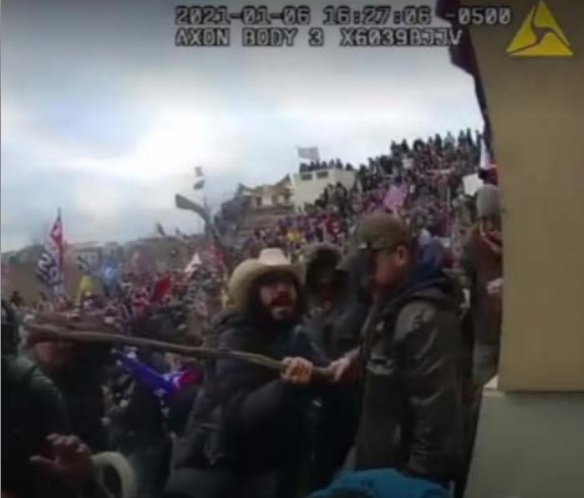 Judge REJECTS request for 1-week release from jail for Jan 6 defendant Jon Mellis, who sought to attend dad's funeral

Mellis is allegedly the man in cowboy hat beating police with a stick.

DOJ called him flight risk, due to potential for "significant" prison sentence in case