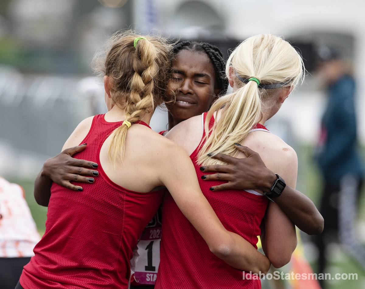 SmillerPhoto's tweet photo. One of my favorite moments from the state track meet today. Boise High School’s Rosina Machu, center, hugs her teammates at the finish line of the 3,200 meters race. https://t.co/i2LSQTCfif