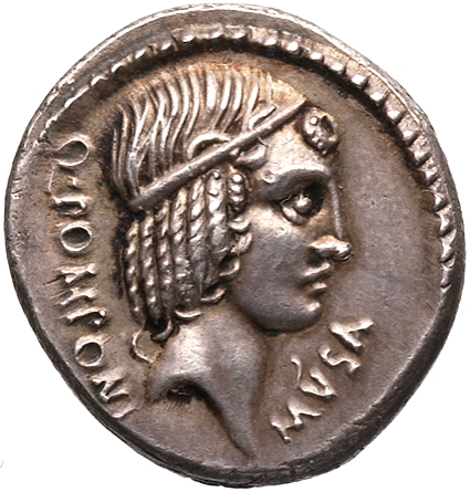 The Obverse of the coin shows a portrait of Apollo, with what must be conceded is rather a Daedalic hairstyle, sporting an elaborate hairband. The entire series of ‘Muse’ coins will be unified by an Obverse portrait of Apollo, though this one is idiosyncratic within the series.