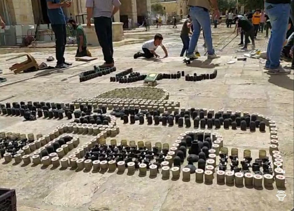 dianabuttu's tweet photo. Palestinians use empty stun grenades and tear gas canisters to make replica of Al Aqsa. #FreePalestine https://t.co/hTEnDYshg5