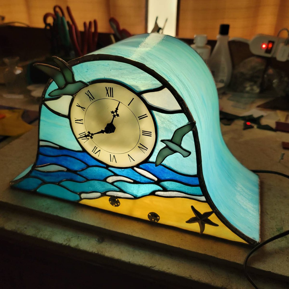 PrismtreeStudio's tweet photo. Had to wait till after mother's day as this fabulous clock was received by it's owner! I used multiple techniques in fused and stained glass to make this, and it was fun as always. I'd be interested in designing more! #stainedglass #etsy #smallartist #customart #glassclock https://t.co/XuAhuPvBSP
