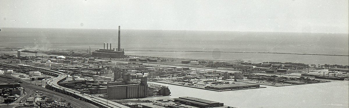 10. But let’s look at that premise.Here are the Port Lands around 50 years ago. Perhaps not attractive, but fallow? There is a generating station, a ship unloading coal, an incinerator, oil storage containers, marine terminals, container facilities….it’s an industrial port.