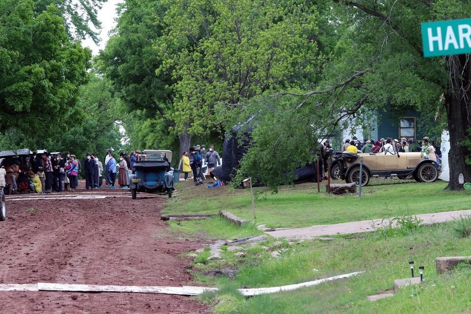 OsageNews's tweet photo. Filming in Fairfax is underway May 10 on the film, "Killers of the Flower Moon." The streets are filling up with movie crew, actors and extras and cars from the 1920s. Osage tribal members are in costume and on set as well with masks on

All photos by SHANNON SHAW DUTY/Osage News https://t.co/0pGQqIsLyP