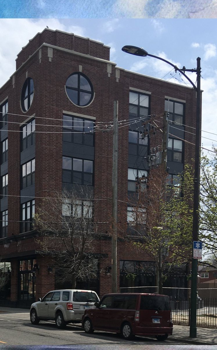 The circular window here, facing Logan Square, isn't a clock and I don't know that I would even describe it as "decorative." How did  @ChicagoDPD let this building depart SO FAR from their original proposal? How can it be prevented from happening again?