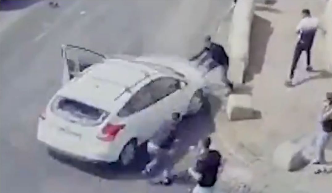 The driver than accelerates forward, sideswiping one man attacking his car and then brutally ramming someone who appeared to be fleeing. We can see in the first clip that the victim has his back turned when the motorist started to accelerate.