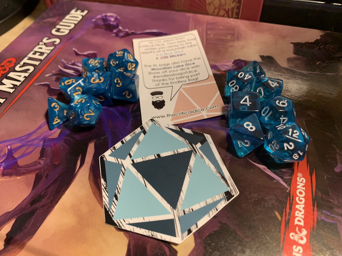 adventurerscc's tweet photo. Every month, @critical_dice knocks it out of the park! That XL bag is so sweet, too. Even had two awesome d20 stickers in it. (Only one shown because the other was immediately stolen.) 
#dnd #criticaldice #subscription #dicegoblin https://t.co/moQ45kTcpn