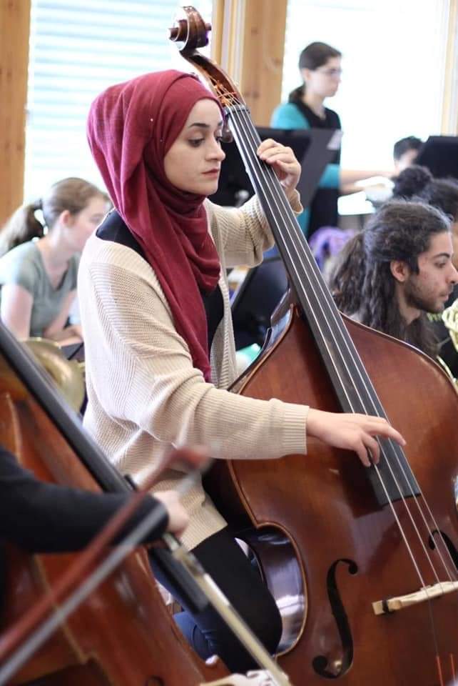 The Palestinian brave girl Mariam Afifi who was beaten and arrested by Israeli soldiers is a Cello musician in the Palestine Youth orchestra. A brave heart and solid will among monsters  #SaveSheikhJarrah