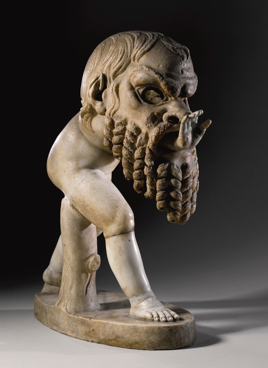 OptimoPrincipi's tweet photo. A marble figure of young satyr wearing an oversized theatrical mask of Silenus. In a delightful sculptural detail, the face of the satyr is visible under the mask. 1st century AD, found at Rome’s Villa Ludovisi, the ancient Gardens of Sallust (horti sallustiani) https://t.co/oWWQES1UxR