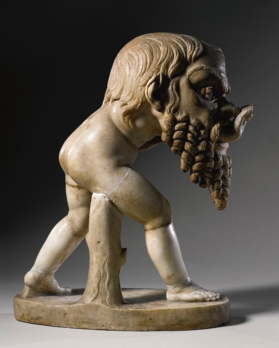 OptimoPrincipi's tweet photo. A marble figure of young satyr wearing an oversized theatrical mask of Silenus. In a delightful sculptural detail, the face of the satyr is visible under the mask. 1st century AD, found at Rome’s Villa Ludovisi, the ancient Gardens of Sallust (horti sallustiani) https://t.co/oWWQES1UxR